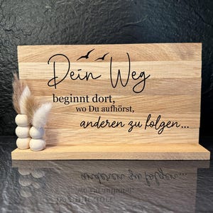 Wooden sign with saying