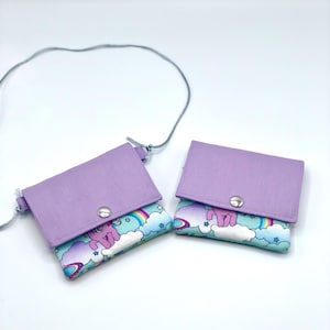 Kindergeldbeutel oder Brustbeutel mit Einhornmotiv / Schmetterling rosa und lila Pastellfarben auch personalisierbar mit Namen