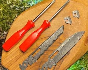 May include: A set of tools featuring a Damascus steel blade, two red-handled screwdrivers, and two small metal pieces. The tools are displayed on a wooden surface with green moss in the background. The tools are labelled "Forge & Bone Custom Est. 2024".