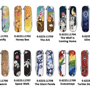 May include: Ten different Swiss Army Knife designs with various colorful patterns. The designs include a dragonfly, honey bee, ark, wolf, stars, woodworm, astronaut, panda, parrot, and turtles. Each knife has a red cross logo and a unique design.