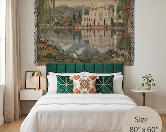 May include: A woven wall tapestry featuring a detailed landscape scene with a white domed palace, reflecting in a calm lake. The scene includes deer, cranes, and wolves in a lush garden setting. The tapestry measures 203 cm by 152 cm.