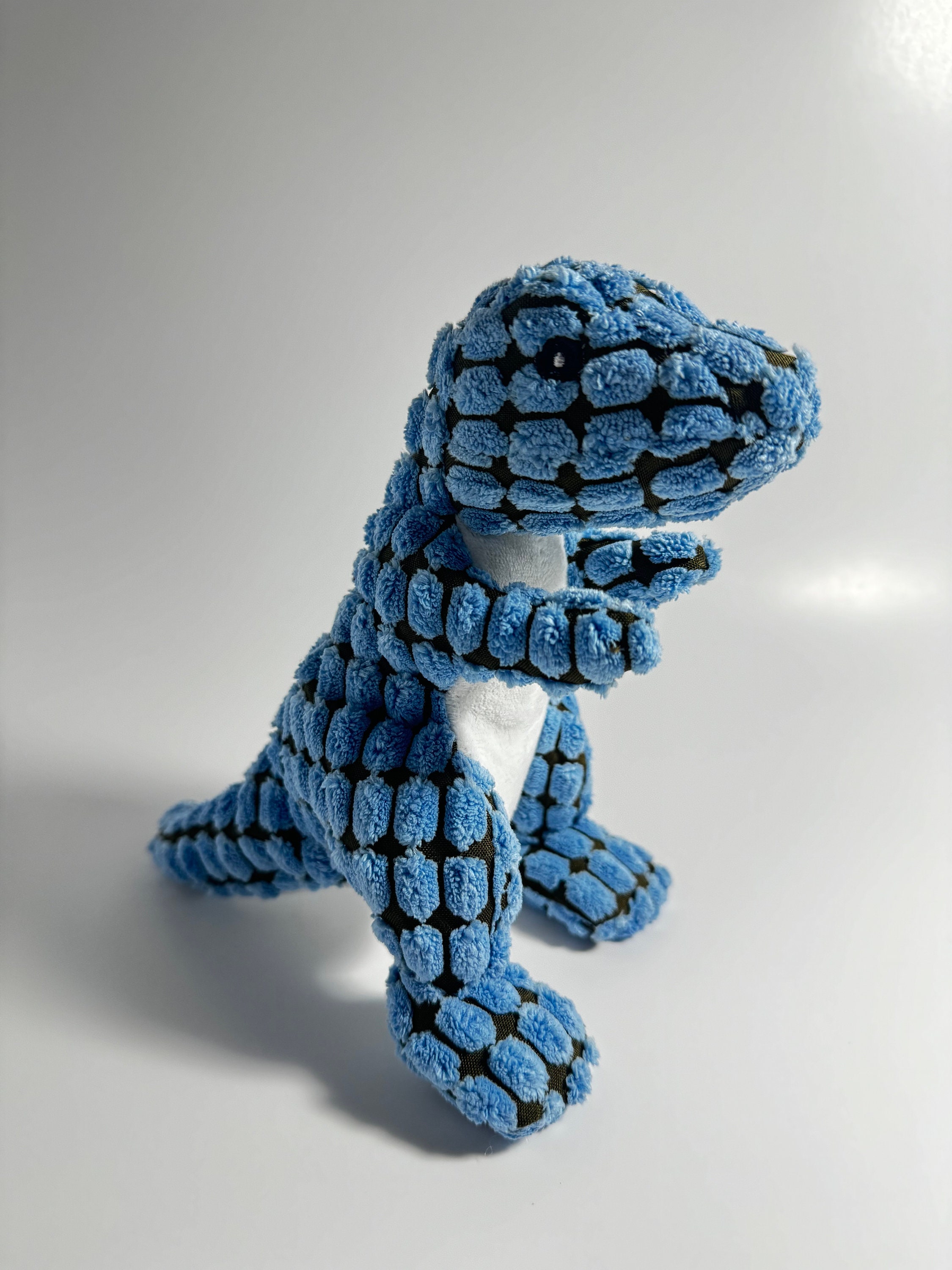 Blue dinosaur dog clearance toy