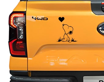 Snoopy con adesivo a forma di cuore