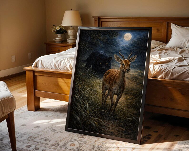 May include: Framed art print depicting a deer in a forest setting under a full moon. A black panther is lurking in the background. The artwork features detailed brushstrokes and a dark, moody color palette, creating a dramatic wildlife scene.
