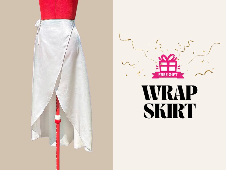 May include: A white wrap skirt made of a silky fabric, displayed on a red dress form. The skirt has a wrap design with a tie closure. The image also includes the text "WRAP SKIRT" and a "FREE GIFT" graphic.