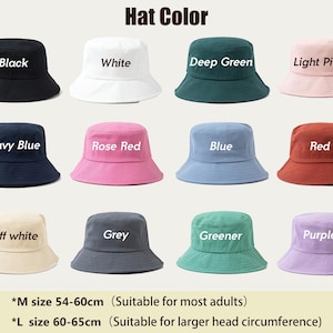 May include: A selection of bucket hats in colours such as black, white, and navy blue. Each hat features a rounded crown and a downward-sloping brim. The text "Hat Color" is at the top. Sizes are available for head circumferences of 54-60cm and 60-65cm.