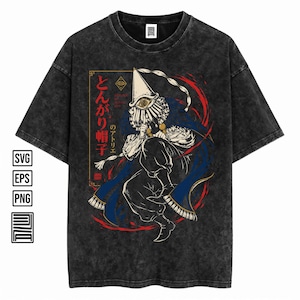 May include: A charcoal acid-wash t-shirt featuring a graphic illustration of a figure in a pointed hat with a large eye, wearing a blue cape and white clothing. The design includes Japanese text, a small eye symbol, and red circular accents.