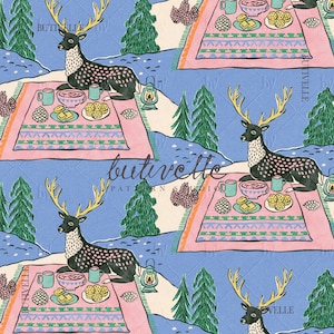 May include: A repeating pattern fabric design featuring a black deer with large yellow antlers resting on a pink blanket. The scene includes green pine trees, a lantern, and plates of food on a blue background with the text butivelle pattern studio.