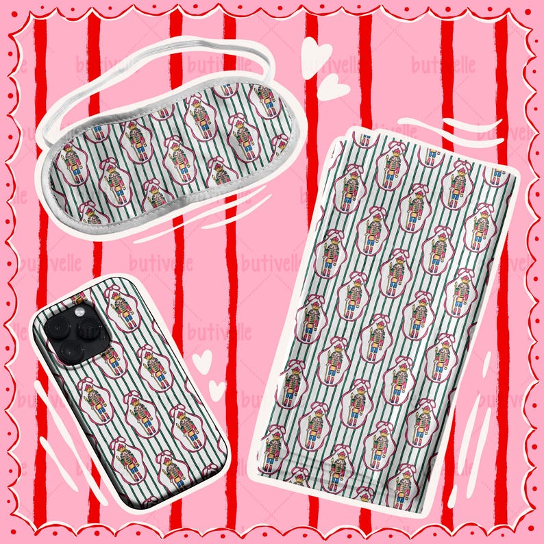 May include: A sleep mask, phone case, and a rectangular item with a repeating pattern of nutcracker figures on a striped background. The items are on a pink background with red stripes and white hearts.