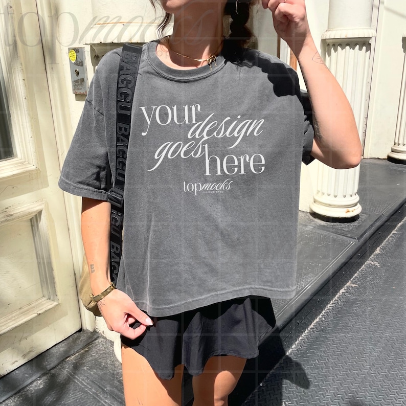 This Comfort Colors Boxy Tee Pepper Mockup is perfect for showcasing your designs featuring the 3023CL boxy tee style this Y2K crop top mockup offers a realistic and aesthetic presentation ideal for lifestyle and selfie mockups