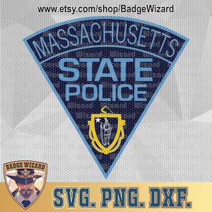 May include: A blue and gold Massachusetts State Police badge with the words "MASSACHUSETTS STATE POLICE" in white lettering. The badge is in the shape of a triangle with a shield in the centre. The shield features a white star and a person standing on a hill.