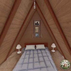 May include: A wooden A-frame cabin interior with a bed, two bedside lamps, and a wall with framed artwork. The bed has a gray comforter and two white pillows.