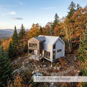 May include: An elevated, modern cabin with a light gray exterior and a contrasting wood-shingled section. The cabin features large windows, a deck, and a metal roof, set amidst a vibrant autumn forest. Text on the image reads: Tilt Loft - Planning Package.