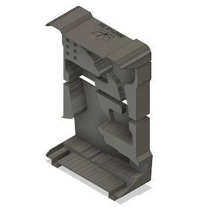 May include: A 3D printed model of a part for a 3D printer. The model is grey and has a snowflake logo on the top with the text "One Step Ahead".