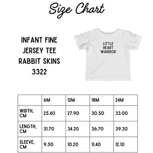 May include: Size chart for an infant fine jersey tee, with measurements in centimeters for width, length, and sleeve length for sizes 6M, 12M, 18M, and 24M. The text "Little Heart Warrior" is printed on a white tee shirt.