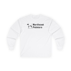 May include: White long-sleeve shirt with the text "Northeast Pointers" in black. A black and white graphic of a dog is to the left of the text. The shirt has a crew neck and long sleeves.
