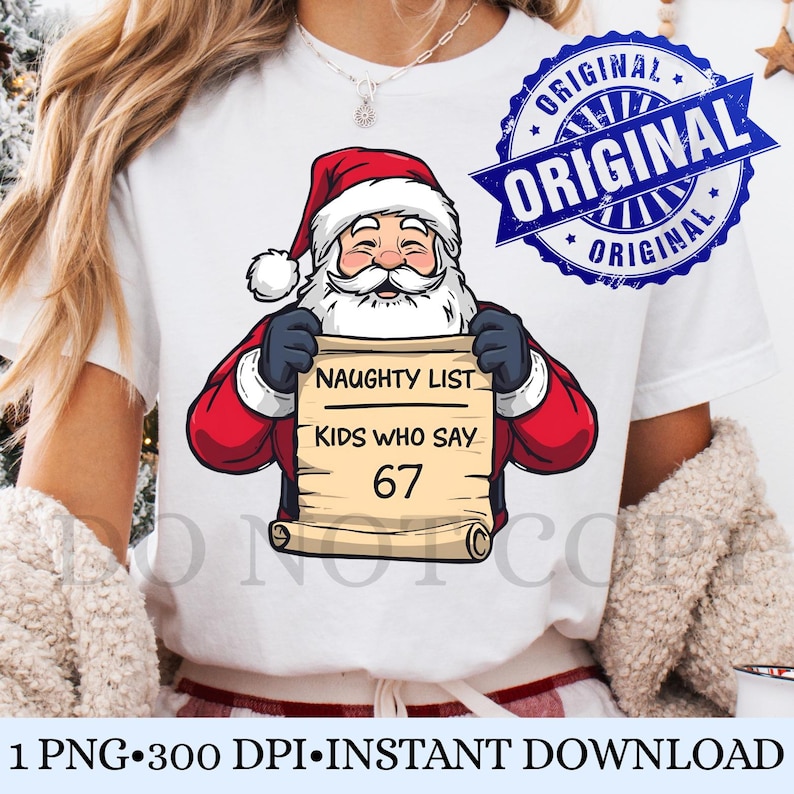 May include: White t-shirt featuring a cartoon Santa Claus holding a scroll that reads "NAUGHTY LIST KIDS WHO SAY 67". The design includes a red Santa suit, black gloves, and a white beard. A blue "ORIGINAL" stamp is in the upper right.
