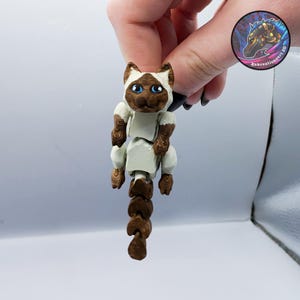 Scruffed Flexi Cat Nyckelring – Fickformat Purrfection!
