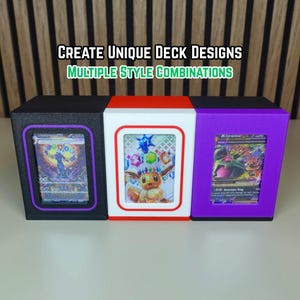 May include: Three card display boxes in black, white, and purple, each showcasing a trading card. The boxes have a framed window design. Text on top reads "CREATE UNIQUE DECK DESIGNS MULTIPLE STYLE COMBINATIONS."
