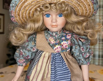 16&quot; Bisque Porcelain Doll – Blonde Curly Hair, Blue Eyes, Straw Hat – New Unity Collectible