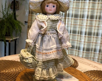 15 inch, Victorian era style, Bisque Doll with  Clothing