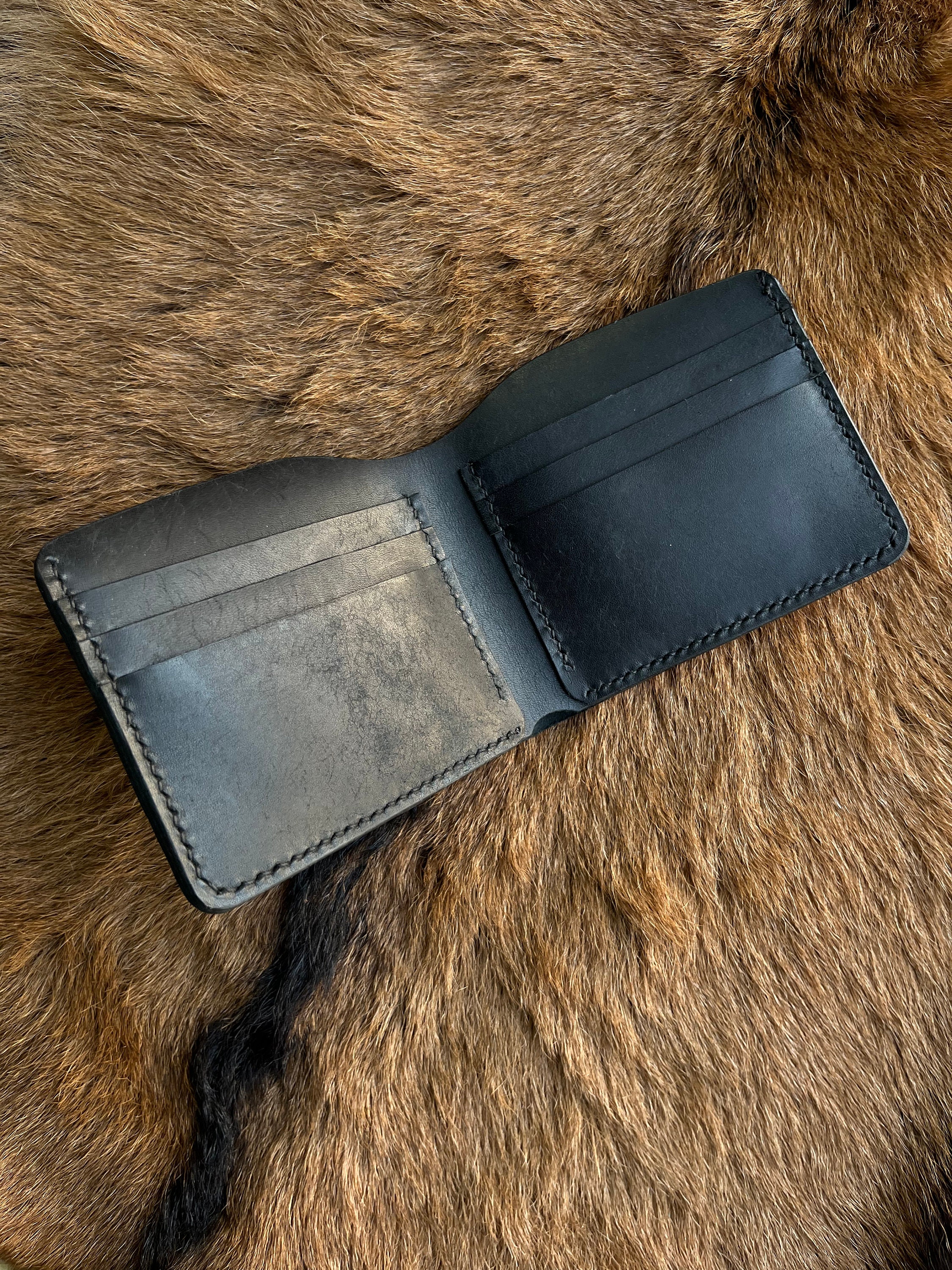 Cartera genuine leather precio new arrivals