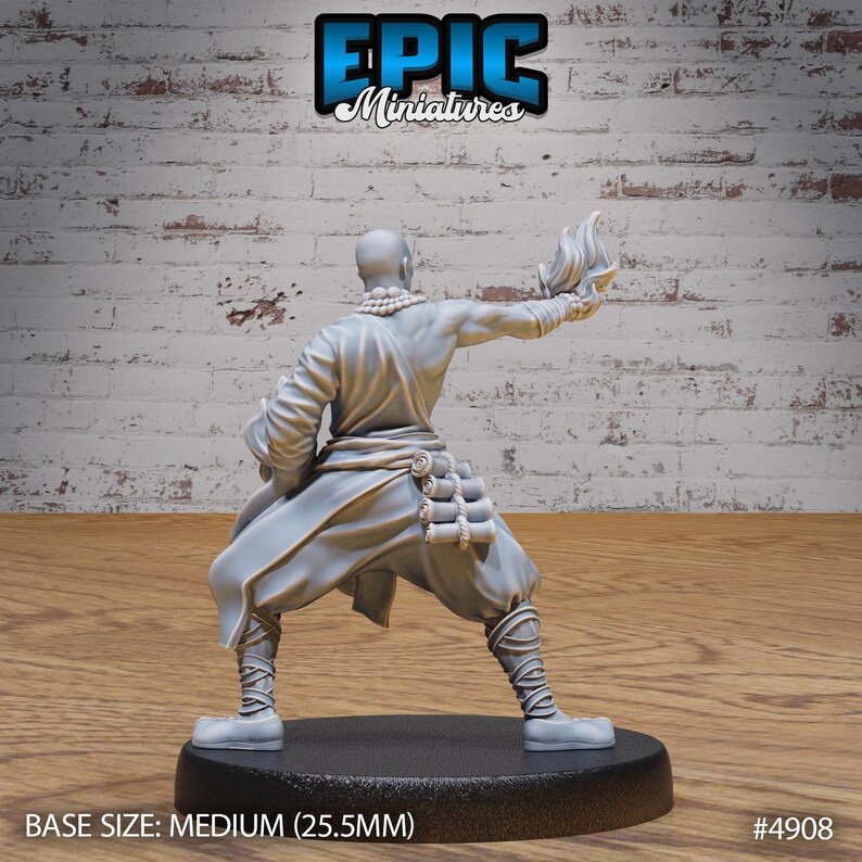May include: A gray unpainted miniature figurine of a person in a robe holding a flaming torch. The figurine is standing on a black base. BASE SIZE: MEDIUM (25.5MM) #4908