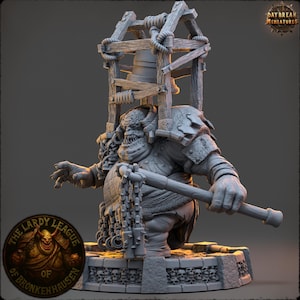 May include: A detailed miniature figure of a monstrous character, holding a club and chained weapon. The figure is gray, with a wooden structure above its head. The base is decorated with skulls. The figure is from "The Lardy League of Bronkenhausen."