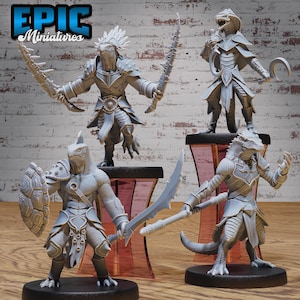 May include: Four gray fantasy miniatures of humanoid creatures, each with unique armor and weaponry. One figure holds a shield and sword, another wields two curved blades, and a third has a scythe. The "Epic Miniatures" logo is in the top left corner.