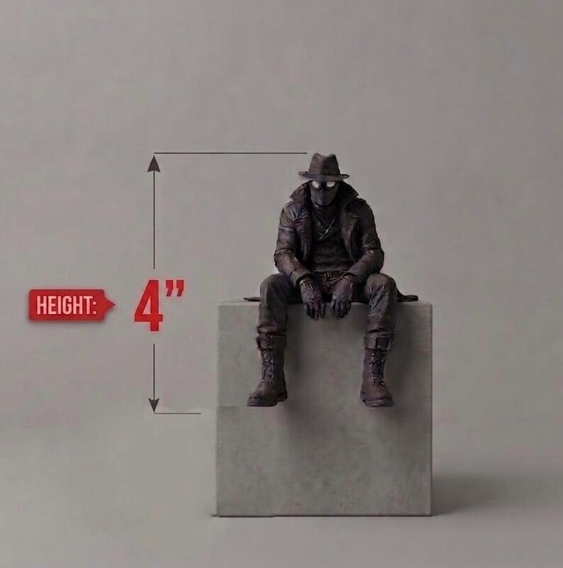 May include: A dark brown figurine of a character wearing a trench coat, fedora, and mask, sitting on a square block. The figure is shown with a measurement indicator showing a height of 4 inches, with the text HEIGHT: 4" clearly visible.