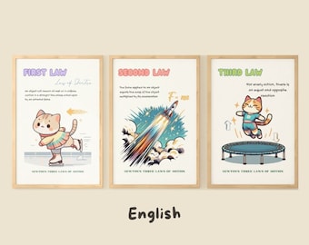 May include: Three framed educational posters with a light wood frame. Each poster features a cartoon cat demonstrating Newton's Three Laws of Motion. The first shows a cat ice skating, the second a rocket, and the third a cat on a trampoline. Text includes "First Law", "Second Law", and "Third Law".