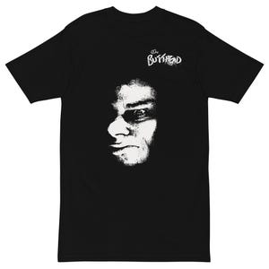 May include: Black t-shirt with a white graphic of a face in shadow. The face is a stylized, high-contrast image. The text "on BUTTHEAD" is printed in white above the face. The shirt has short sleeves and a crew neck.