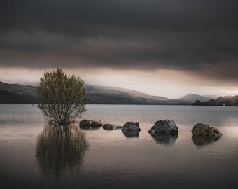 Llyn Tegid beneath a cloudy sunset canvas print