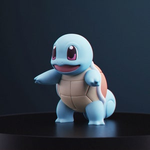 May include: A light blue Squirtle figurine with a tan shell and pink accents. The figure is standing on a black surface, with its arms outstretched. The figurine is a collectible item.