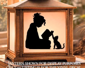 May include: A bronze-colored lantern with a black silhouette of a person reading to a cat. The image is on a white background. The text at the bottom reads: "LANTERN SHOWN FOR DISPLAY PURPOSES ONLY - LISTING IS FOR THE VINYL DECAL."
