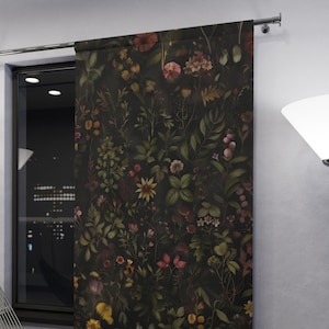 May include: A dark green curtain with a floral pattern featuring various shades of pink, red, and yellow flowers. The curtain is made of a soft, textured fabric and has a subtle sheen.