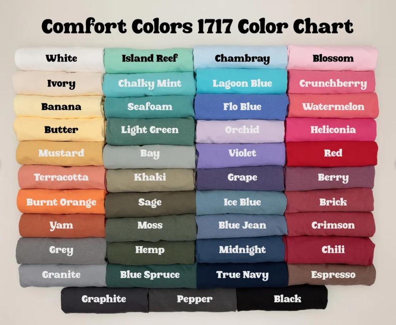 May include: A color chart titled "Comfort Colors 1717 Color Chart" displays a variety of fabric colors. The chart includes shades like white, ivory, banana, butter, mustard, terracotta, burnt orange, yam, grey, and granite.