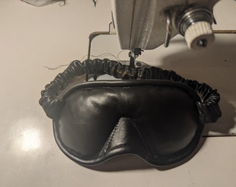 Zwart leren slaapmasker