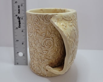 Unique hand built ceramic handwarmer mug. Made with natural, earth tone glazes. Made in the USA. Custom pottery by Tennessee artisan.