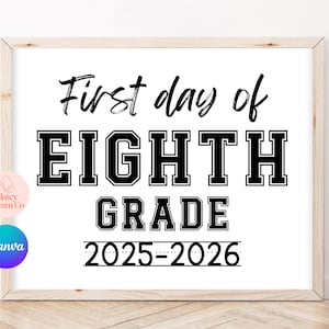 May include: A framed white print with black text that reads "First day of EIGHTH GRADE 2025-2026". The words "EIGHTH GRADE" are in a bold, collegiate font. The frame is light brown.