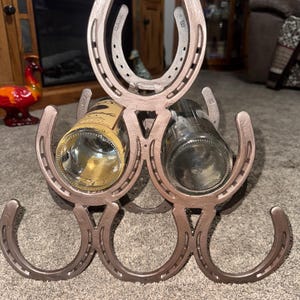 Horse shoe wine rack