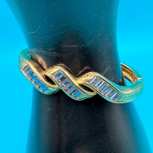 Vintage 1980&#39;s Swarovski Gold Tone Hinged Bracelet with Blue Baguette Crystals - Signed SAL - Excellent Condition
