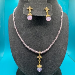 Vintage 1980&#39;s 1928 Jewelry Co &quot;Amethyst&quot; Glass Bead, Crystal Gold Tone Cross Necklace and Matching Post Earrings - Excellent Condition!