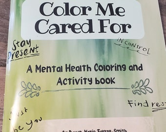 Könnte beinhalten: Ein grünes und weißes Malbuch mit dem Titel "Color Me Cared For" und dem Untertitel "A Mental Health Coloring and Activity Book". Das Buch ist von Dawn-Marie Farrell-Smith.