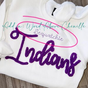 May include: White sweatshirt with purple chenille lettering that says "Sequatchie Indians".
