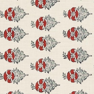 May include: A white fabric with a repeating pattern of red flowers with gray leaves. The flowers have a simple design with five petals and a small circle in the center.