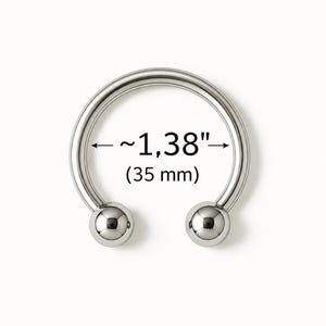 May include: A silver horseshoe-shaped piercing ring with two round ball ends. The ring measures approximately 1.38 inches (35 mm) in diameter. The jewelry is displayed against a plain white background.