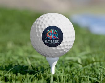 May include: A white golf ball with a black and colorful logo that says "Playful Logic Studios" on it.