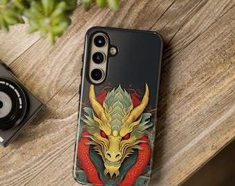 May include: A black phone case with a colorful dragon design. The dragon has red eyes and is surrounded by red and gold accents.