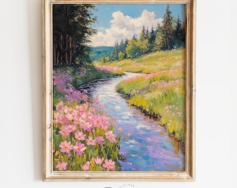 May include: A framed landscape painting depicts a serene river winding through a meadow filled with pink wildflowers. The artwork features a blue sky with fluffy clouds, lush green trees, and a golden-toned frame. The signature "Signature" is visible at the bottom.